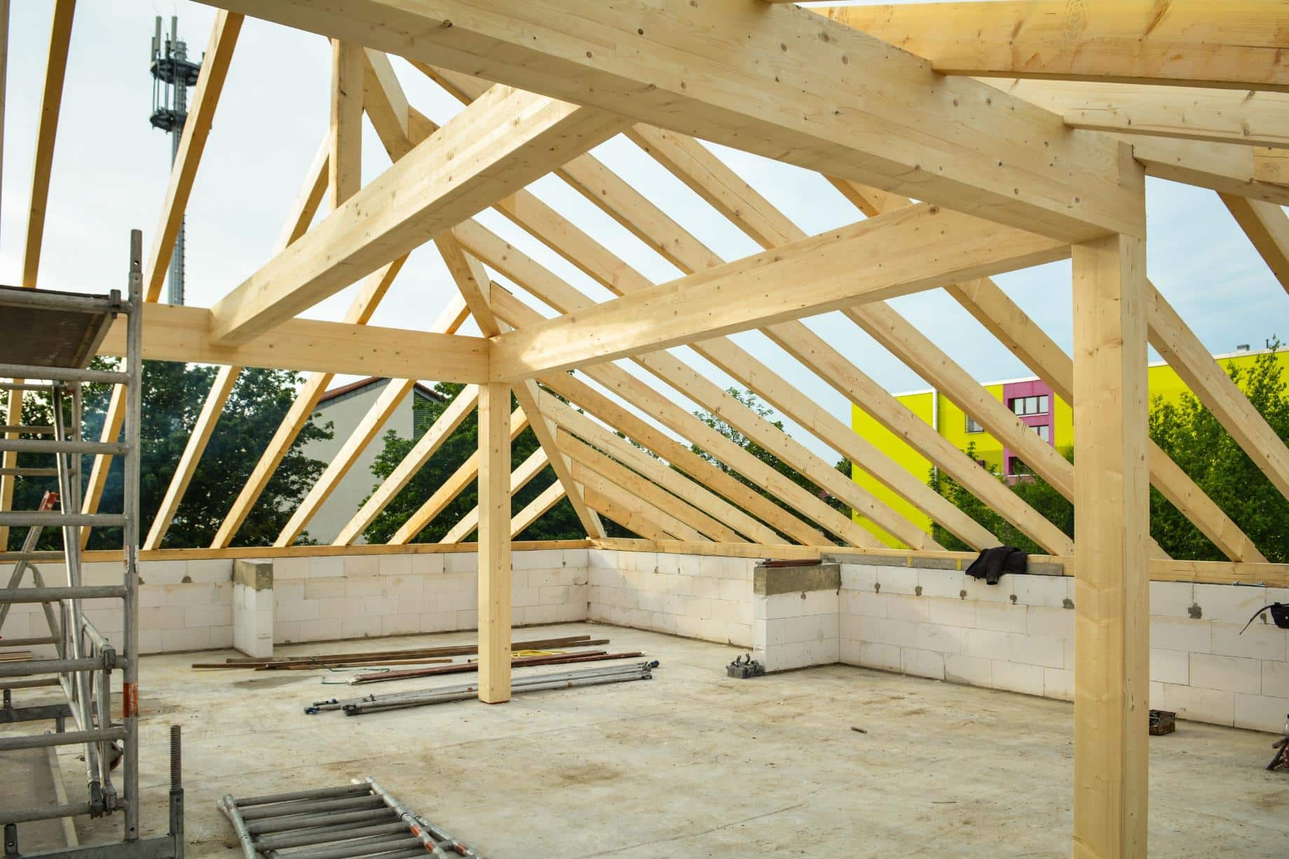 New home under construction with wood framing, representing FHA construction financing for homebuyers.